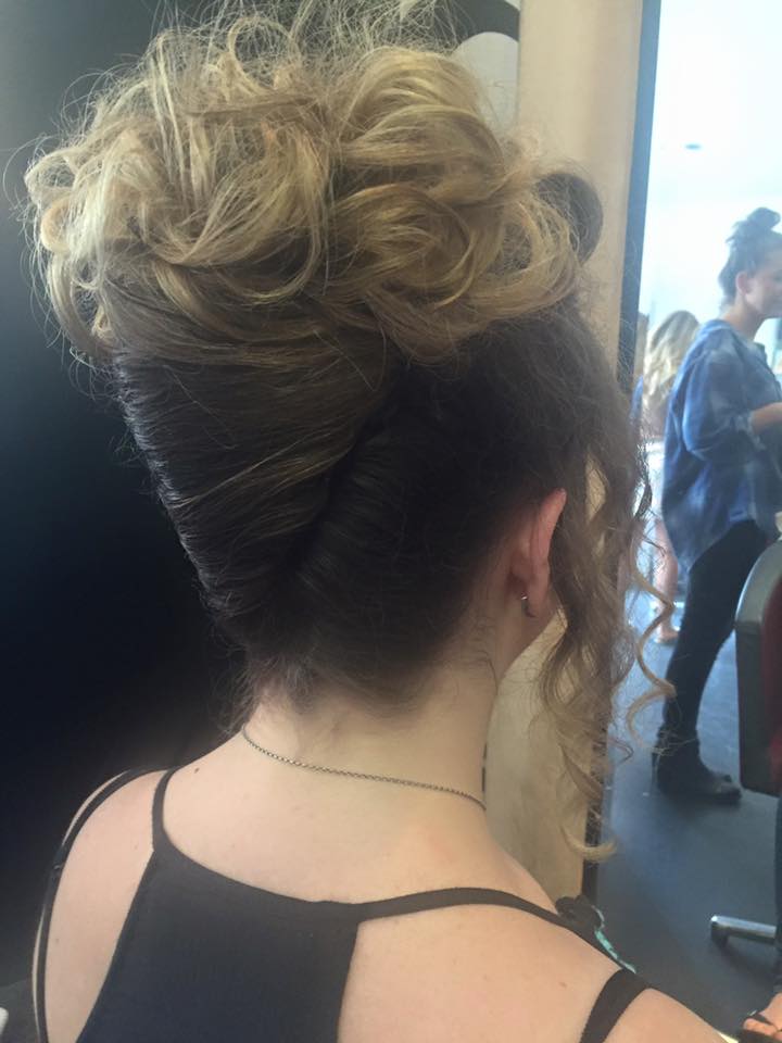 Textured blonde updo styled at Jefferson Buckley